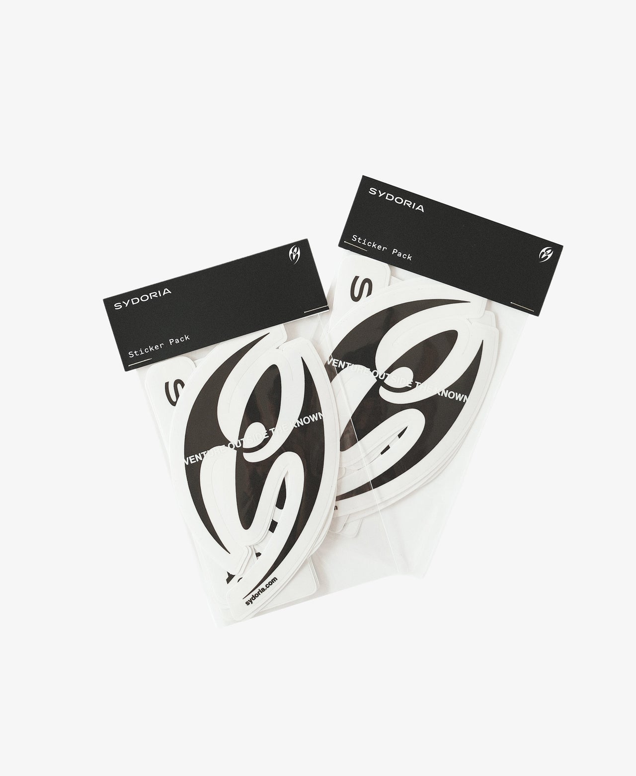 Two packaged black and white Sydoria Sleep Pack stickers on a clean white background.