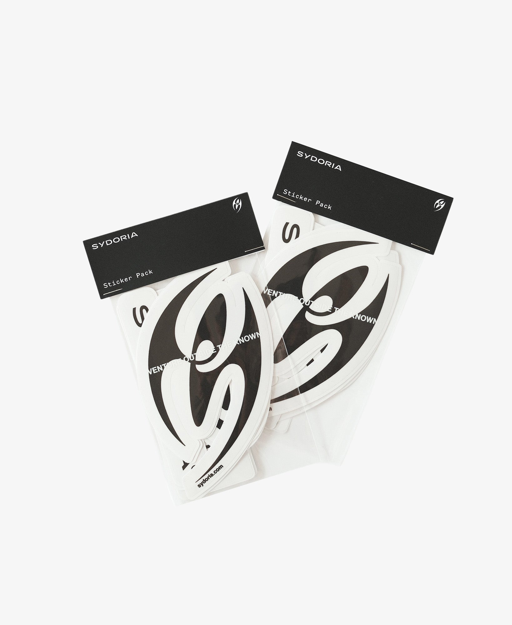 Two packaged black and white Sydoria Sleep Pack stickers on a clean white background.