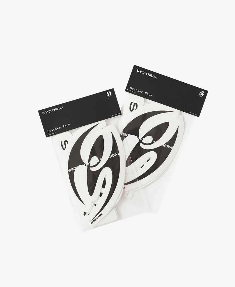 Two packaged black and white Sydoria Sleep Pack stickers on a clean white background.